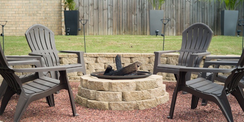 Fire pit surrounded by chairs