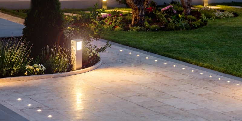 Walkway lit with landscape lighting